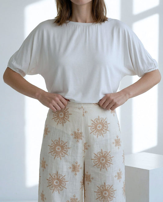 Pantalón ancho crudo estampado dorado Surkana