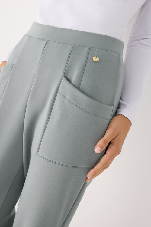 Pantalones slim afelpados tiro alto con bolsillos azul