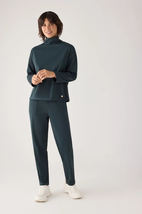 Pantalones slim textura piqué tiro alto verde botella