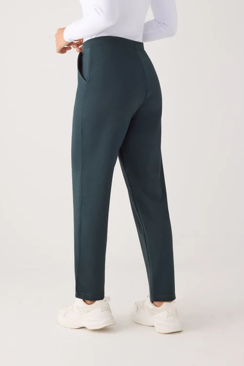 Pantalones slim textura piqué tiro alto verde botella