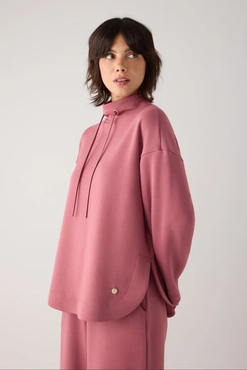 Jersey afelpado cuello alto con cordones rosa