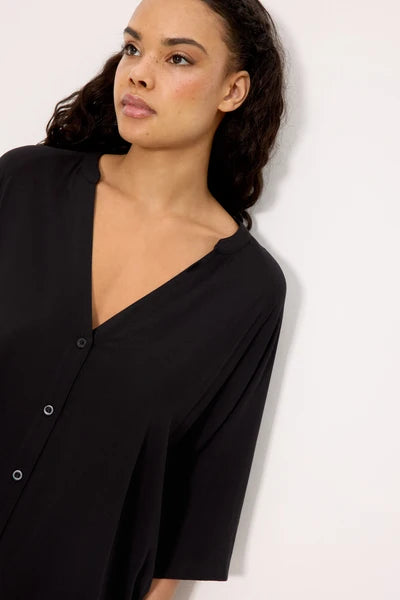Camisa larga media manga negra